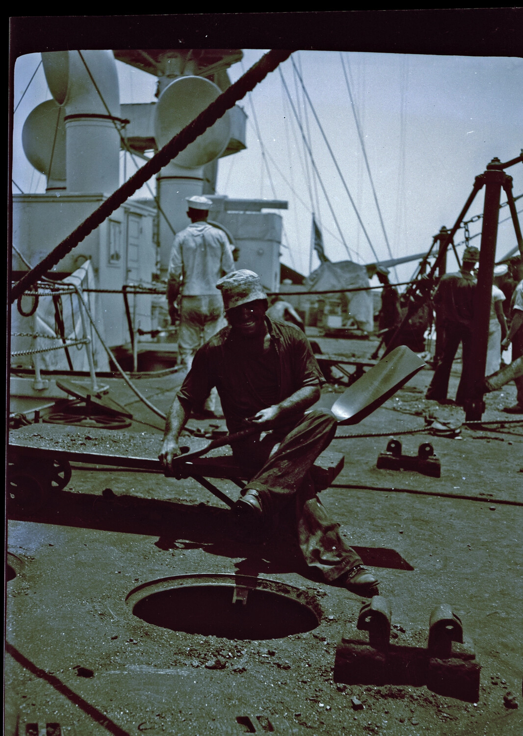 Sailor Coaling Ship Aboard a U.S. Navy Vessel, China Station, Pre-WWII