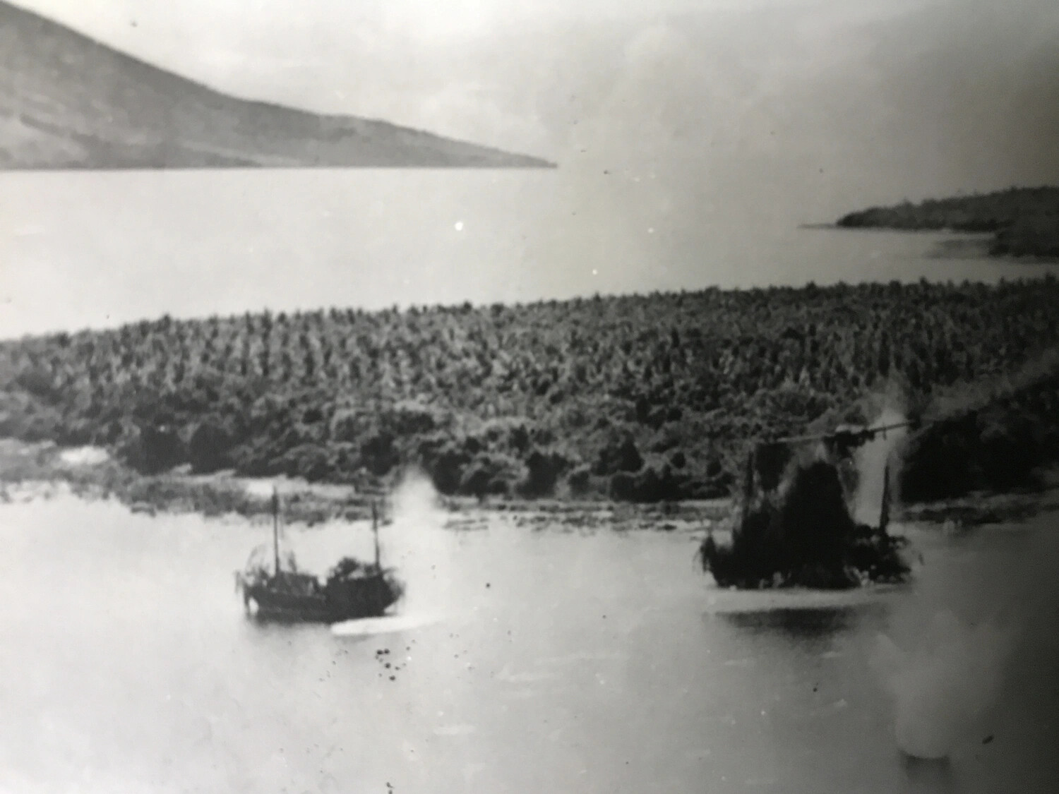 Strafing Attack on Camouflaged Japanese Supply Barges, New Guinea Coast (Continued Sequence)