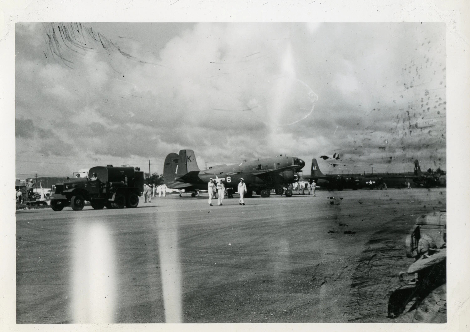 Naval Air Transport Squadron Aircraft on Airfield Ramp, Pacific Theater (VR-6 Guam/Manila Album)