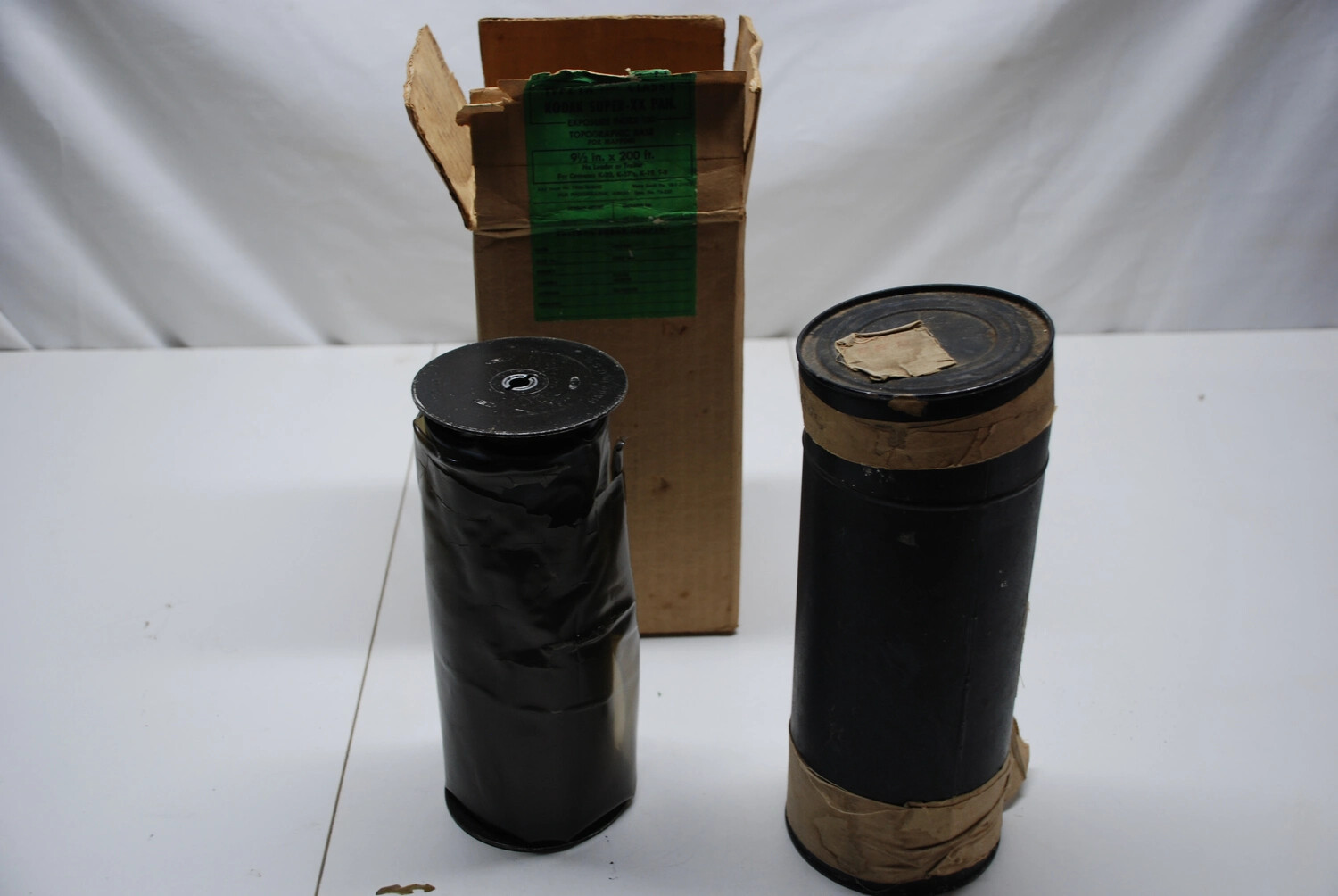 Wartime Aerial Mapping Film Rolls and Storage Canister, Kodak Super-XX Pan, China-Burma-India Theater Collection