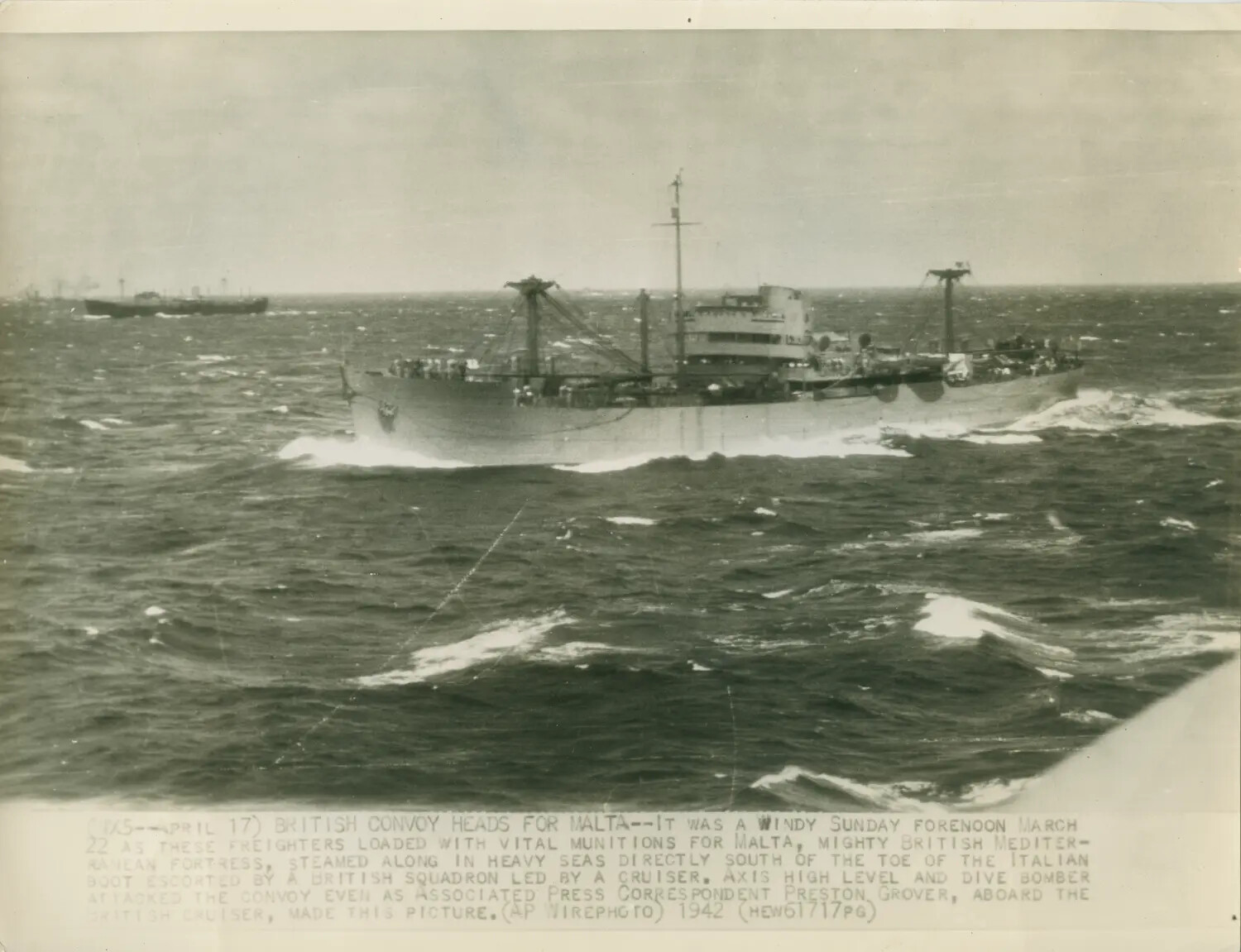British Convoy Heads for Malta: Freighter Steaming Through Heavy Seas Under Axis Air Attack, March 1942