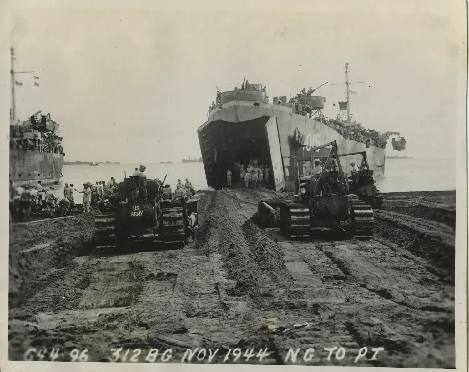 Bulldozers Grading Beach Exit Road Beside LST-1015, November 1944