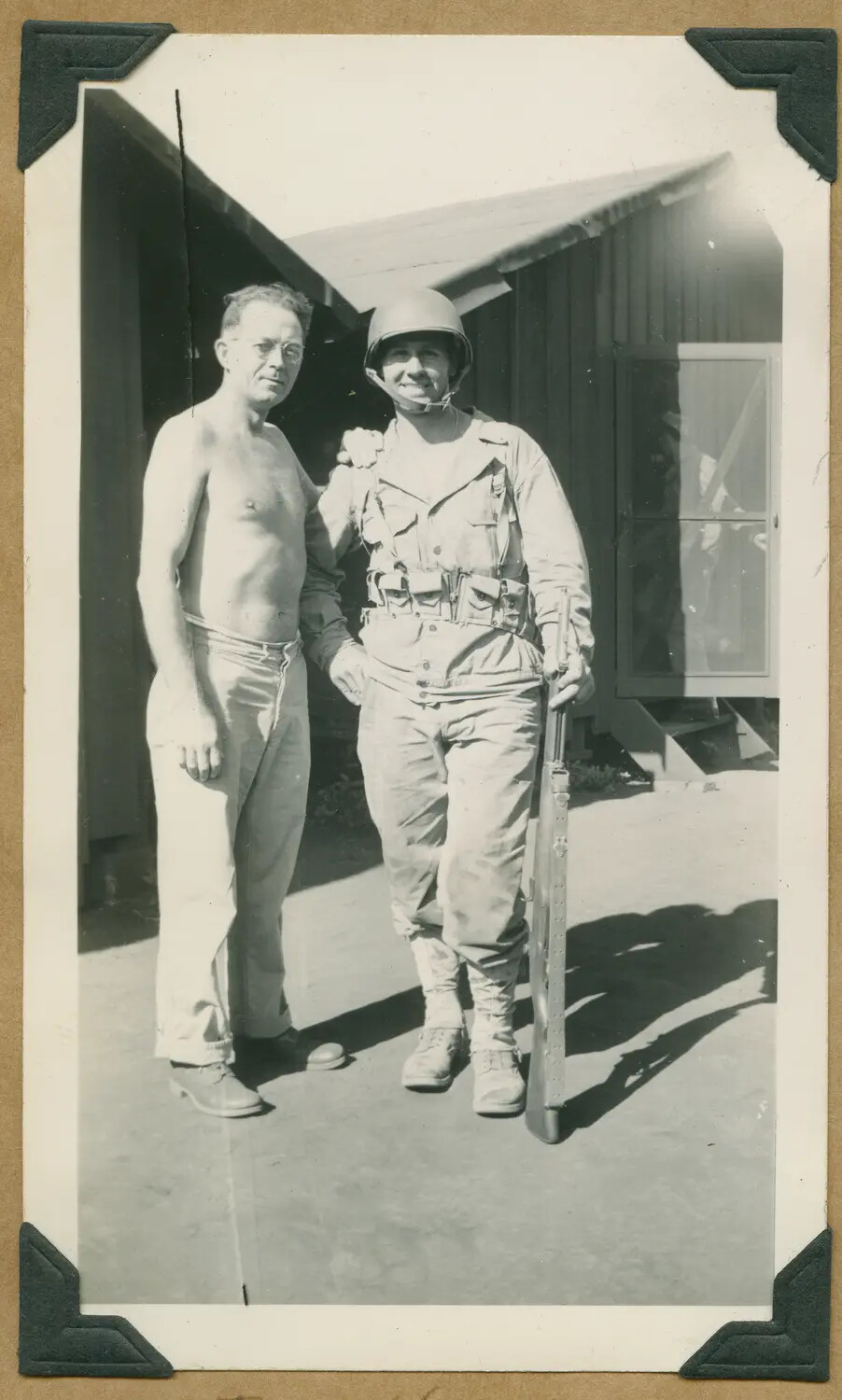 Servicemen in Contrasting Dress, One in Full Combat Gear, Hawaii, WWII Era