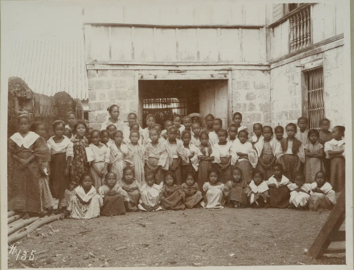 Group Portrait of Filipino Girls and Young Women in a Courtyard, Philippines, c. 1890s