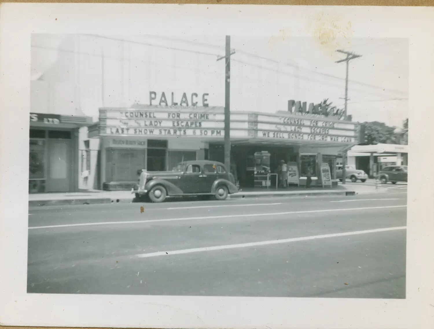 Palace Theatre Marquee with War Bond Advertisement, Hawaii, WWII Era