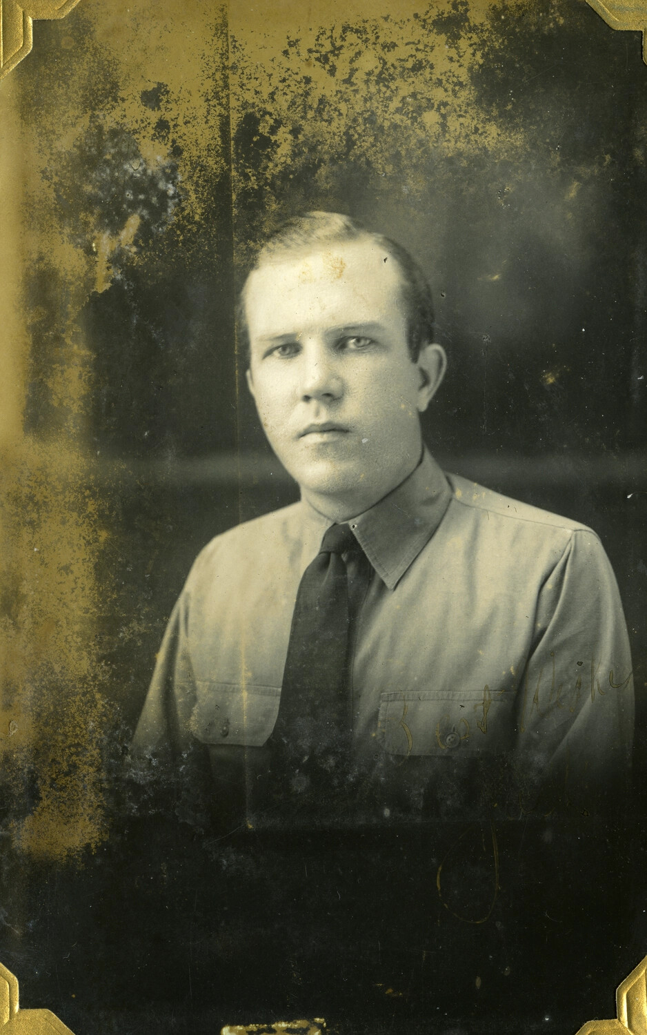 Studio Portrait of a Young Man in Shirt and Tie, Manila Photo Album
