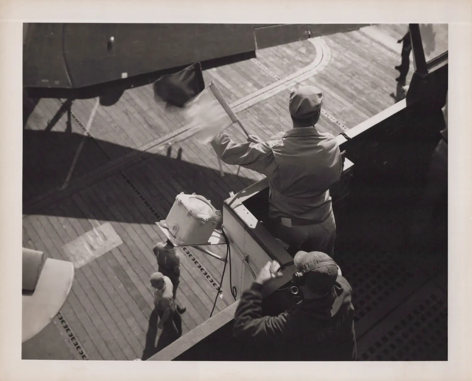 Signalman Sending Flag Signal from Carrier Island, Unidentified WWII U.S. Navy Escort Carrier