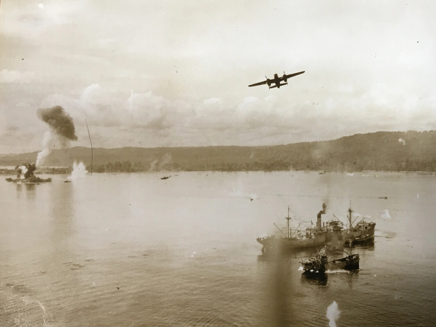 B-25 Mitchell Climbs Away After Harbor Strike on Japanese Shipping