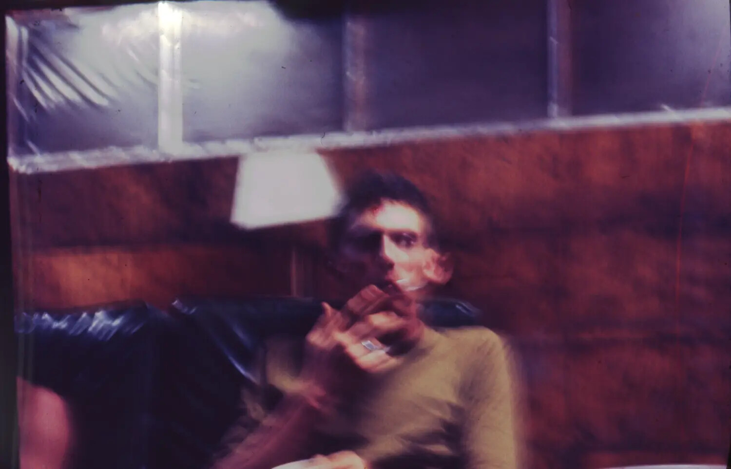 Man Smoking in Wood-Paneled Interior, Vietnam-Era 35mm Slide