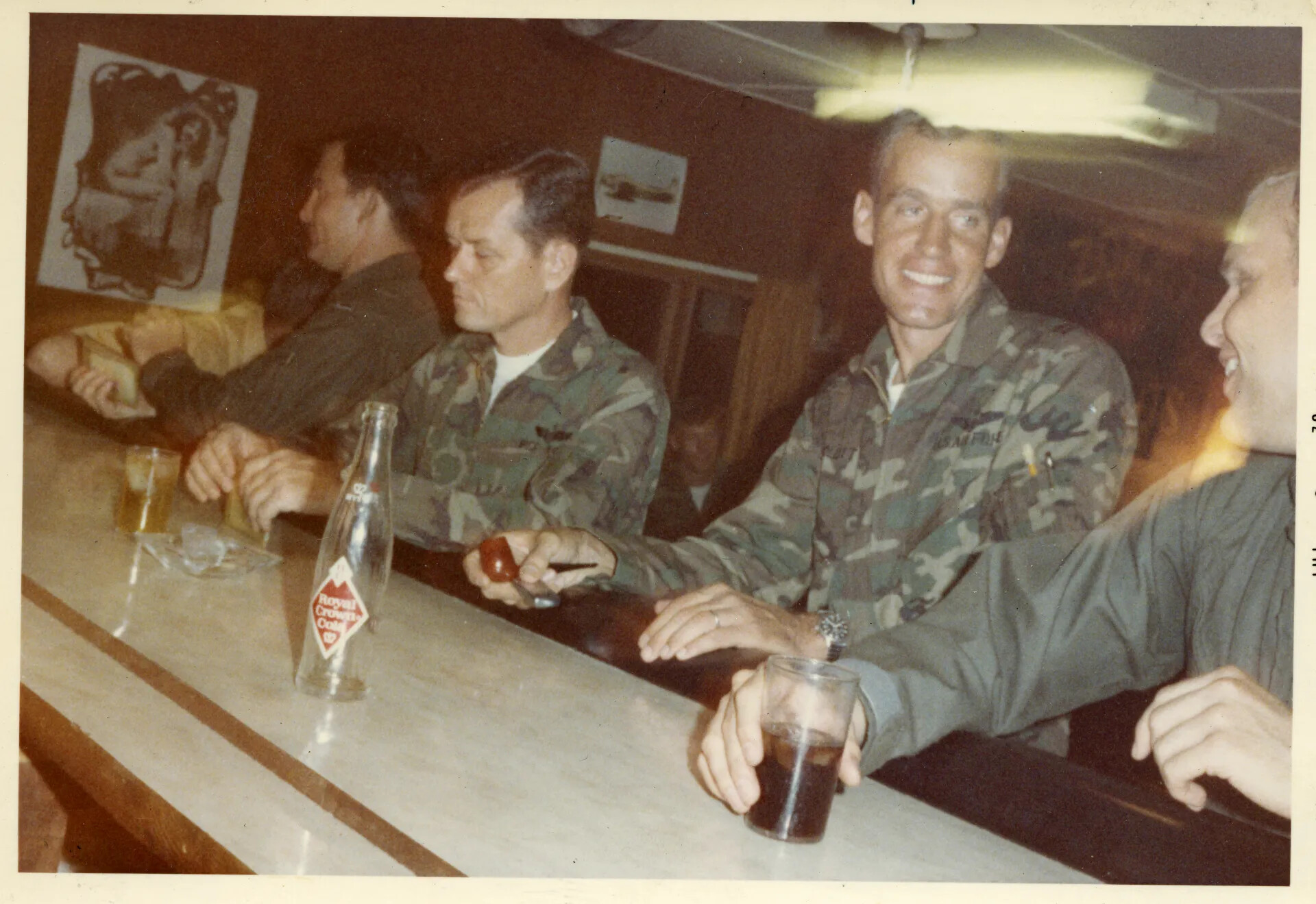 USAF Personnel Relaxing at Officers' Club Bar, Likely Nakhon Phanom RTAFB (NKP), Vietnam War Era