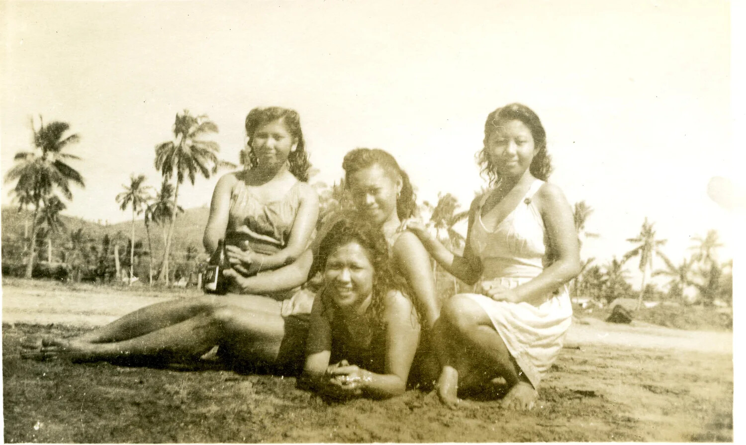 Group Portrait of Four Young Women on Beach, Pacific Theater, WWII Era