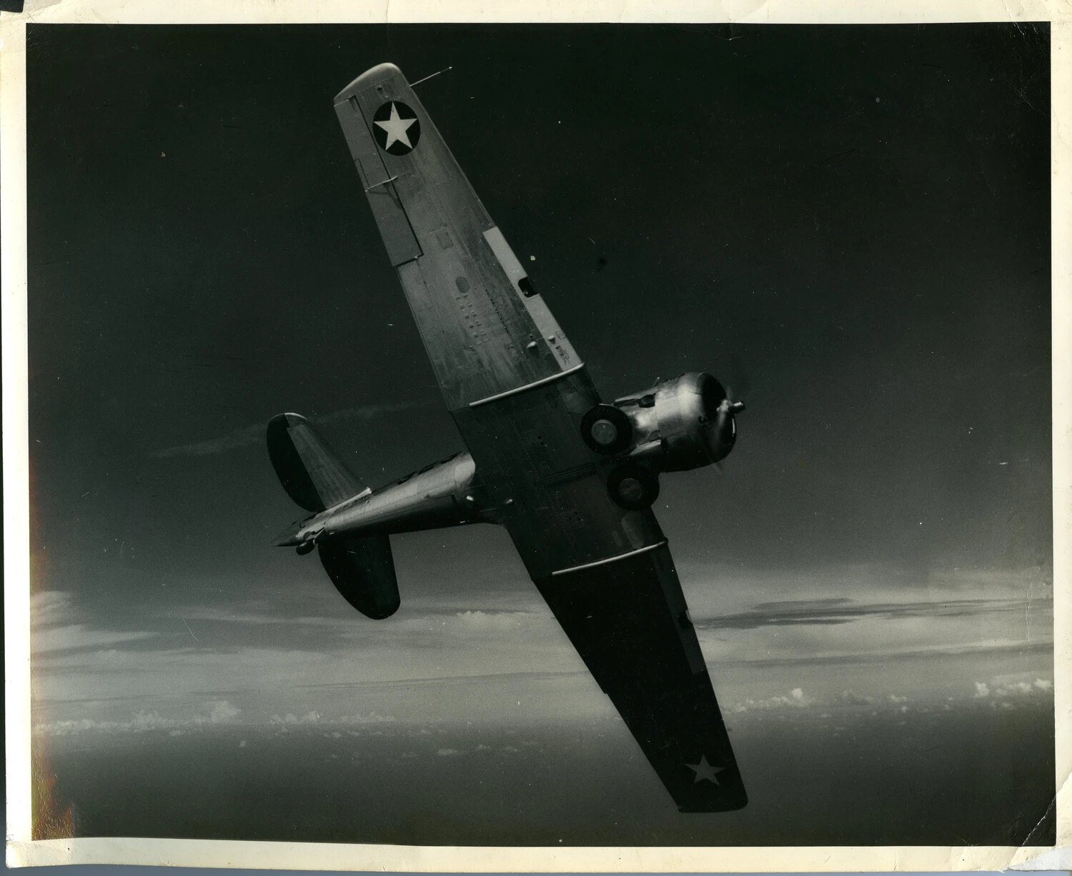 U.S. Army Air Forces Single-Engine Fighter Banking Steeply in Flight, Early WWII Period (c. 1942-1943)