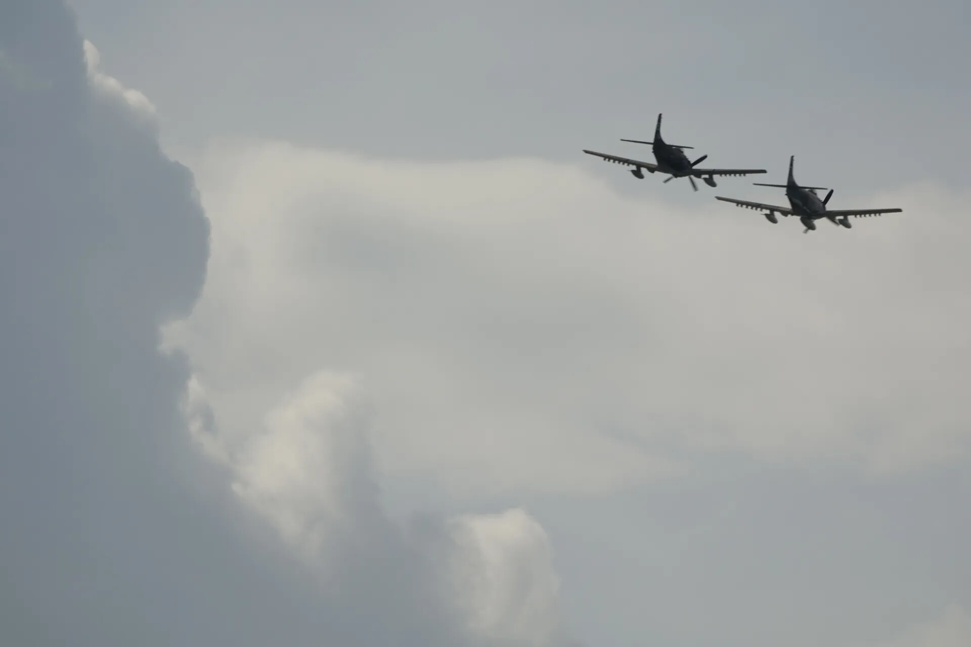 Two-Ship Formation Flight Against Storm Clouds — May 2019 Event