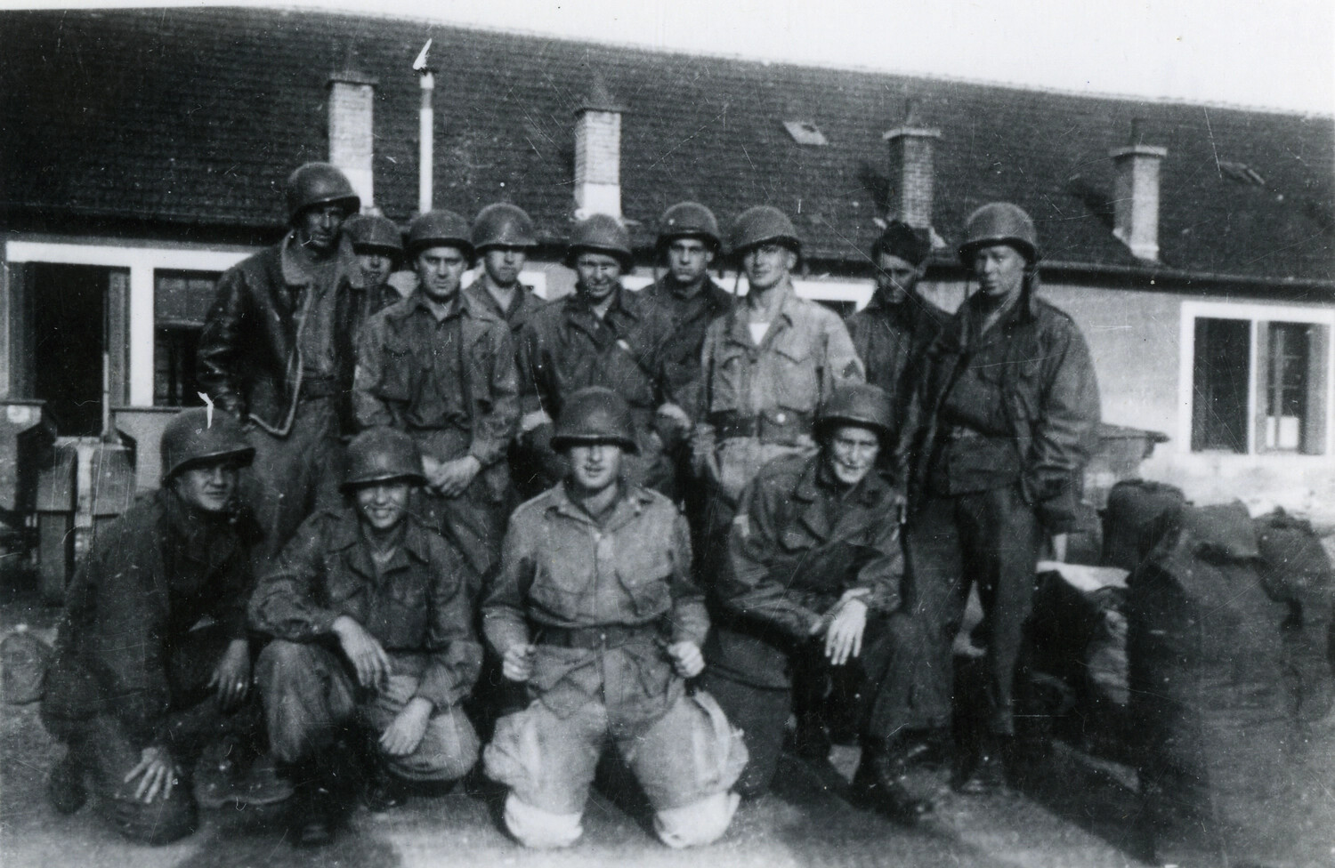 Group Portrait of American Paratroopers Outside European Billet, WWII