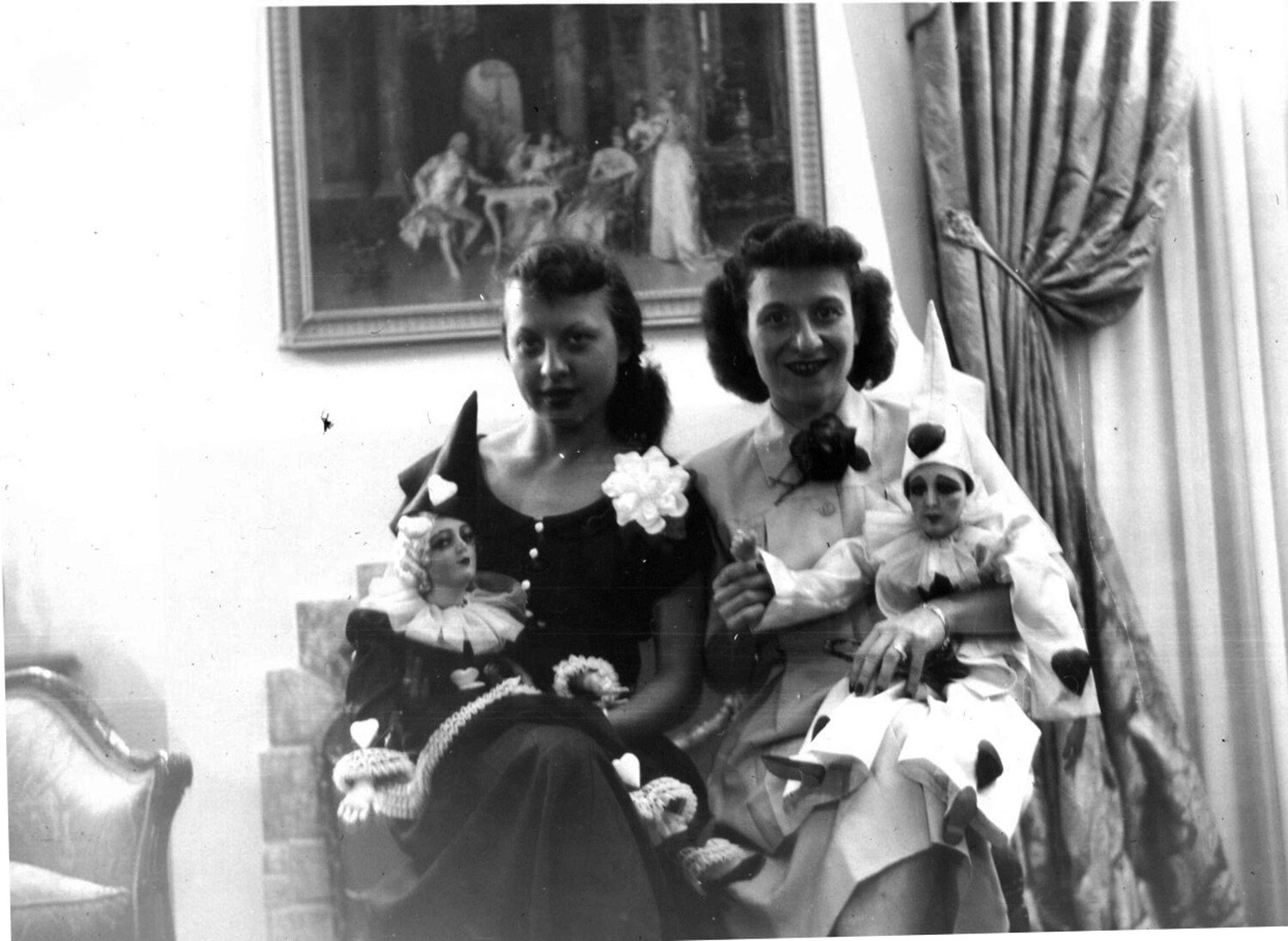 Two Women with Pierrot Dolls in a Formal Parlor, 1940s-Era Portrait