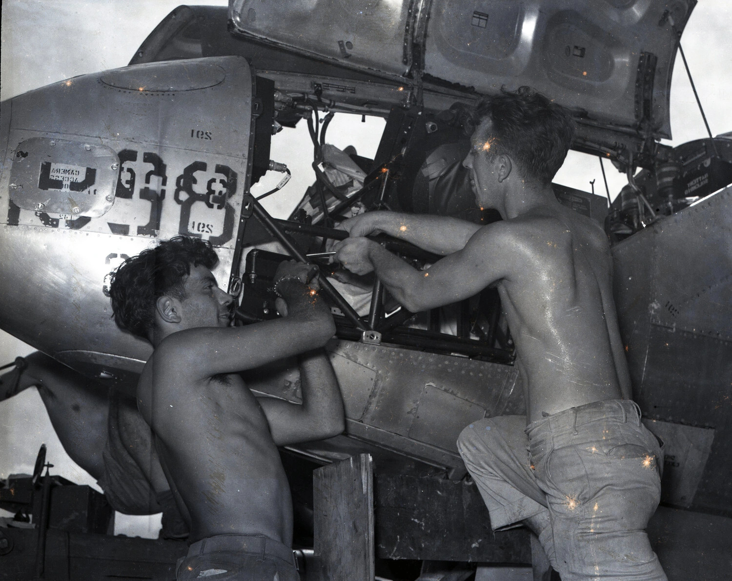 Ground Crew Servicing Fighter Aircraft Engine, China-Burma-India Theater, WWII