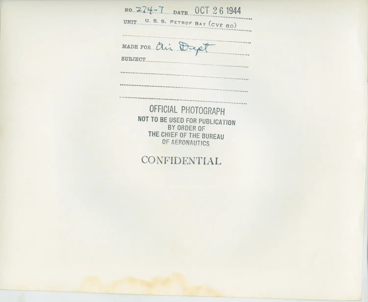 Verso of Official U.S. Navy Photograph, USS Petrof Bay (CVE-80), Dated 26 October 1944, Marked CONFIDENTIAL