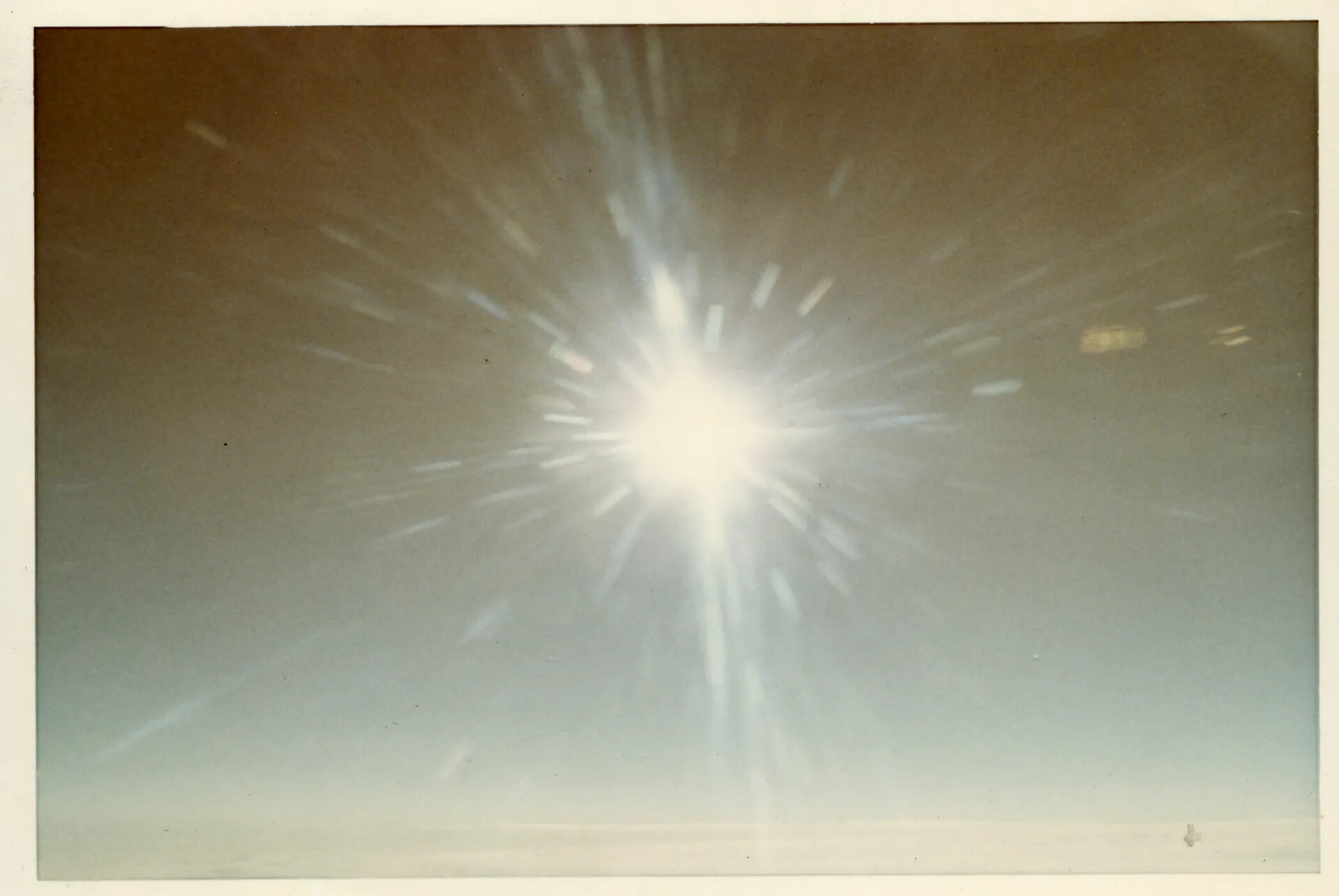Sunburst with Lens Flare Over Hazy Horizon, Vietnam Color Photos Collection