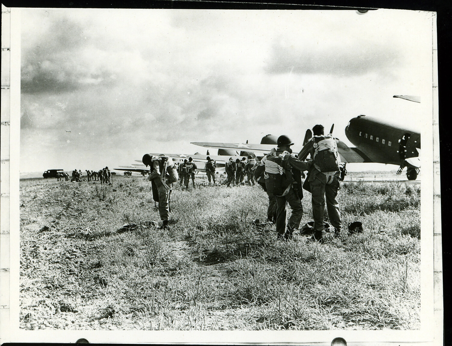 101st Airborne Division Paratroopers Marching to C-47 Transport Aircraft Before a Jump