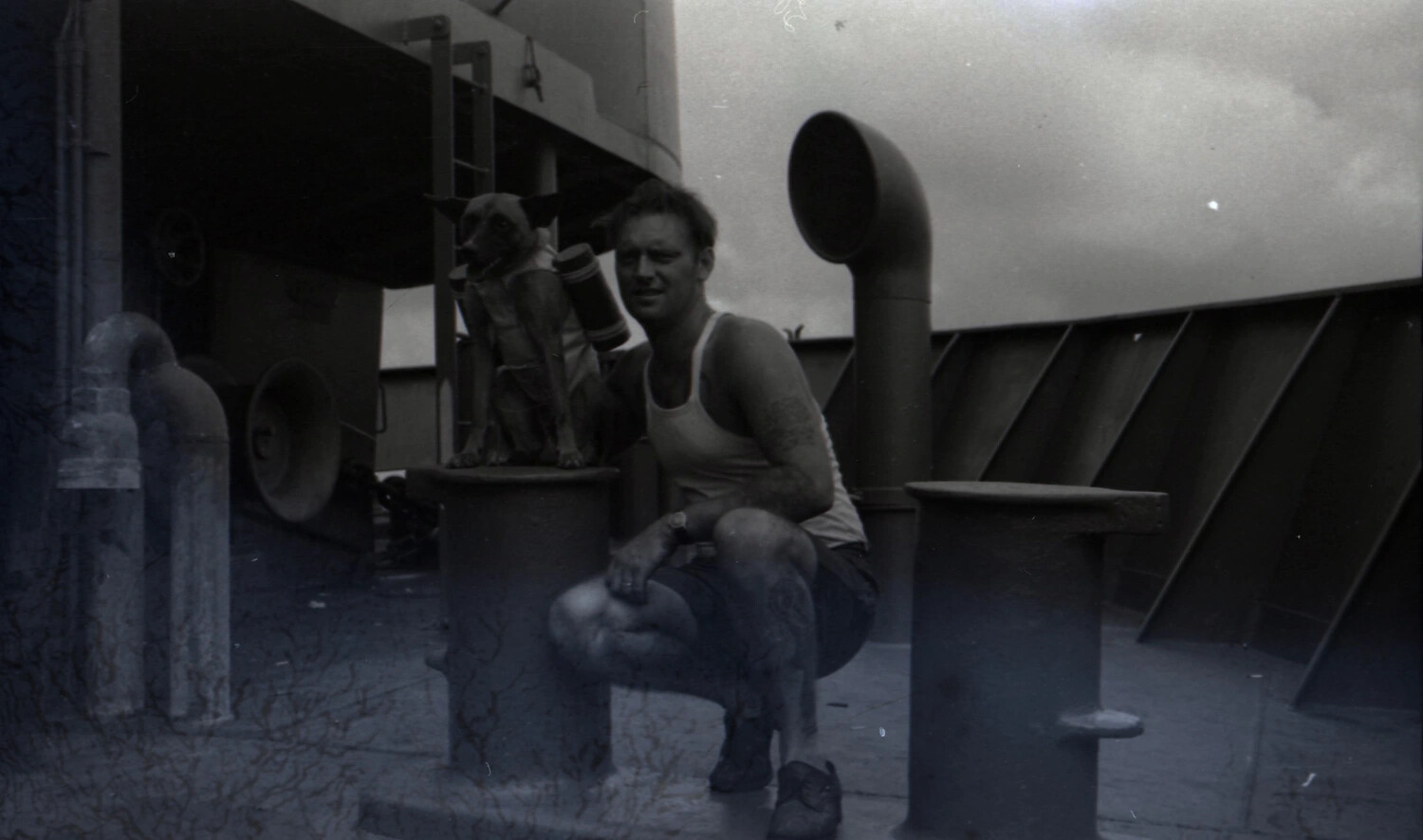 Serviceman with Mascot Dog on Ship Deck, WWII China Burma Collection