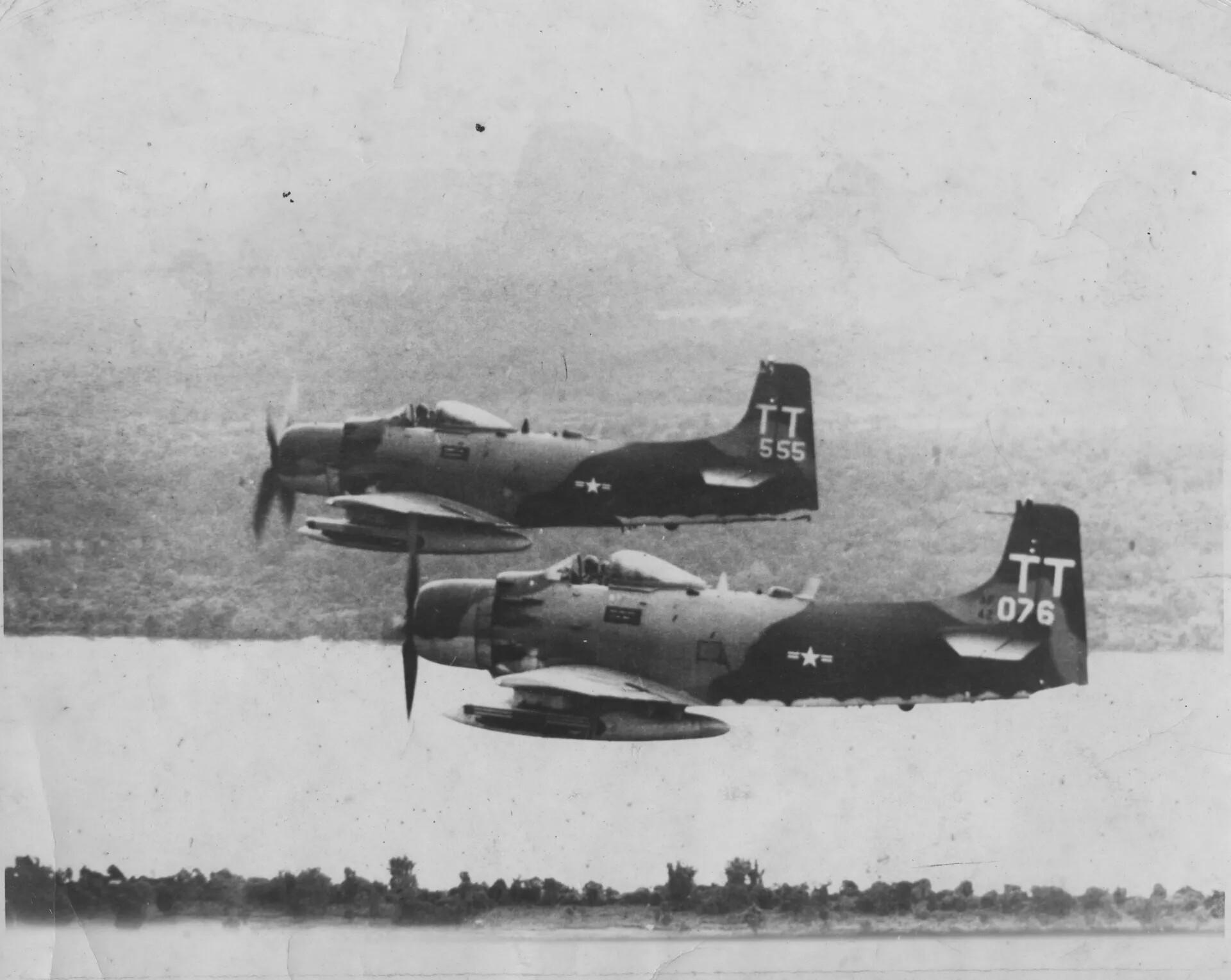 Two A-1 Skyraiders in Formation, Tail Codes TT 555 and TT 076, Vietnam War Era