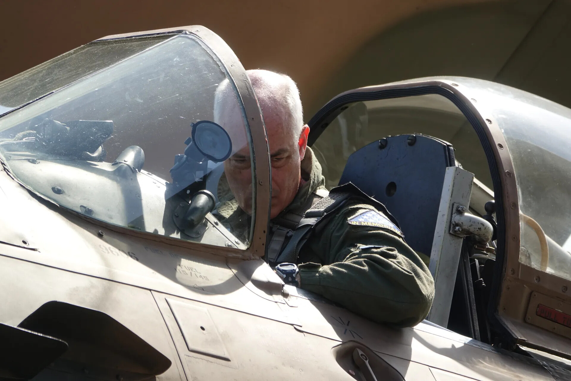 Veteran Examining Cockpit Gunsight of Preserved Douglas A-1 Skyraider, May 2019 Event
