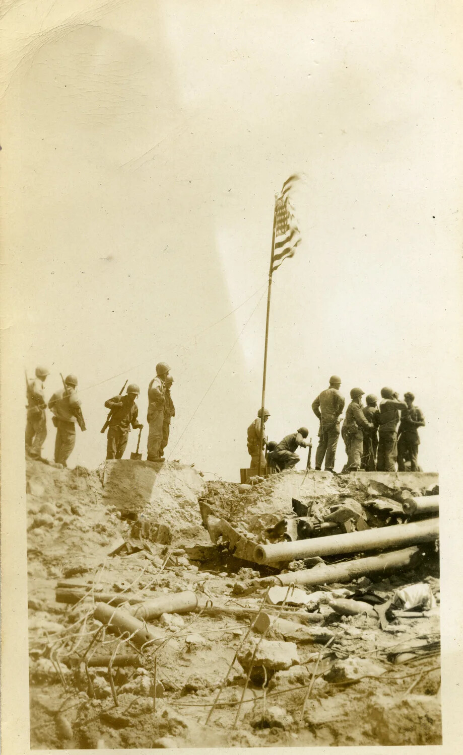 American Troops Raise the U.S. Flag Amid Shattered Fortifications, Kwajalein Atoll, 1944