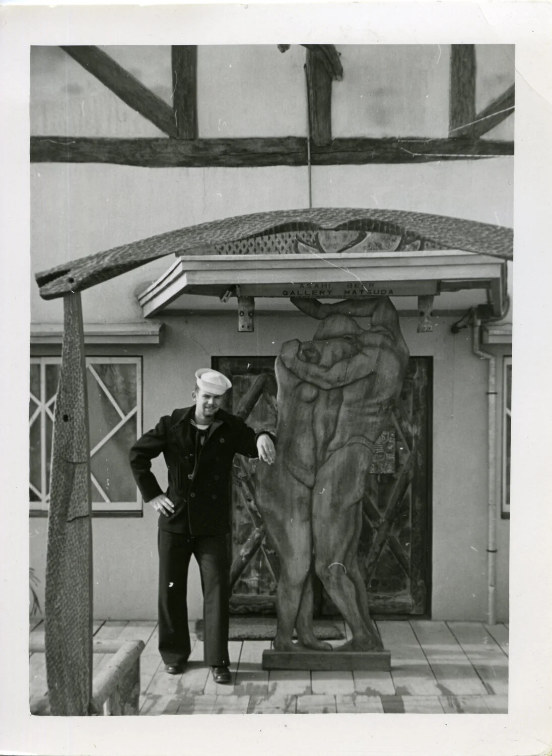 U.S. Navy Sailor Posing at 'Asahi Beer Gallery Matsuda,' Japan, Korean War Era