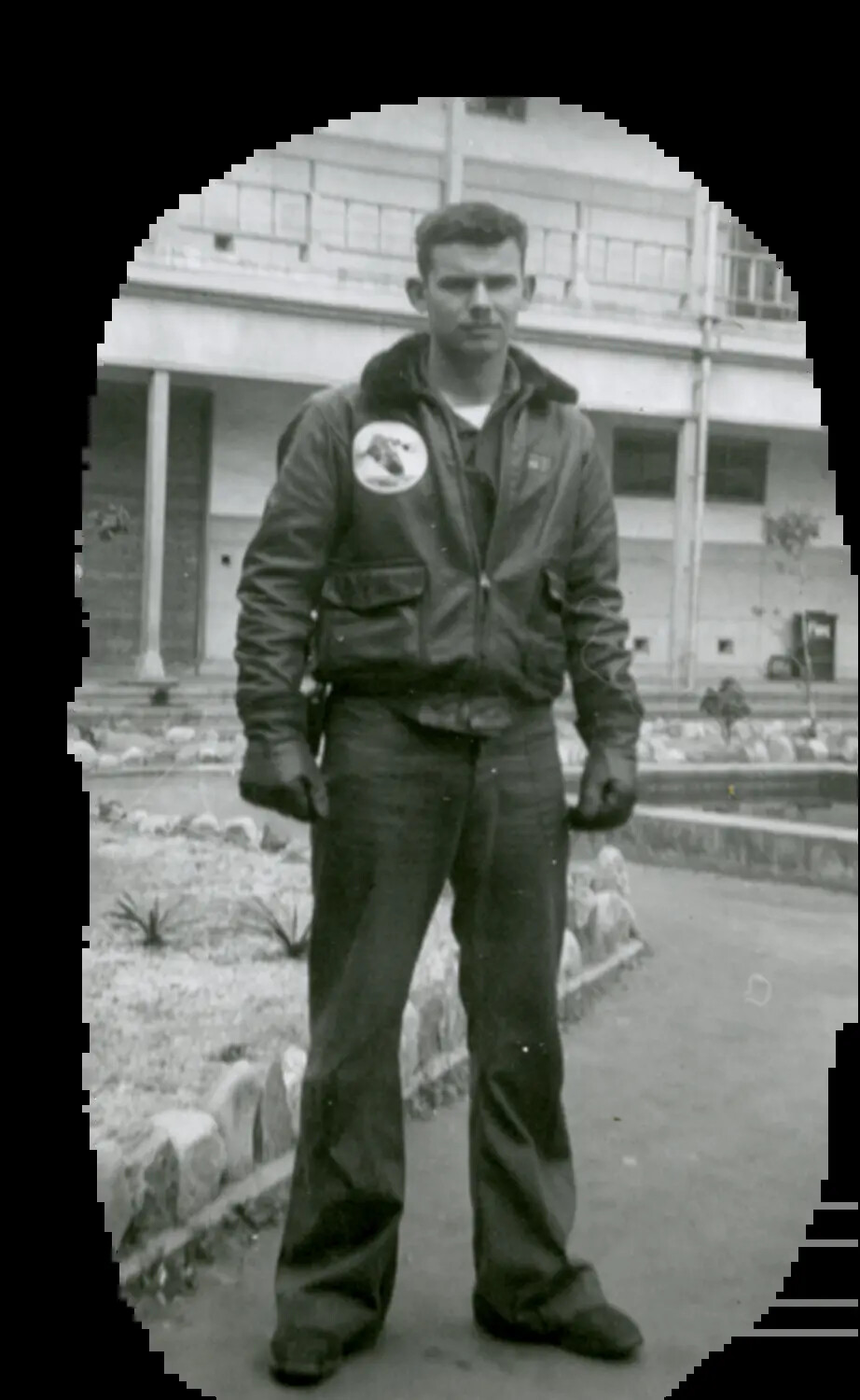 U.S. Navy Aircrewman in Flight Jacket, Naval Air Station Courtyard, Korean War Era