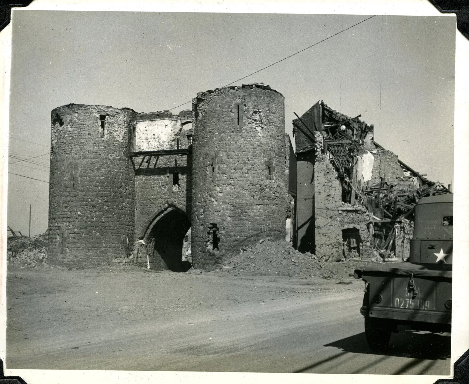 War-Damaged Medieval Gatehouse and Ruined Building, European Theater, WWII (Jervey Signal Corps Collection)