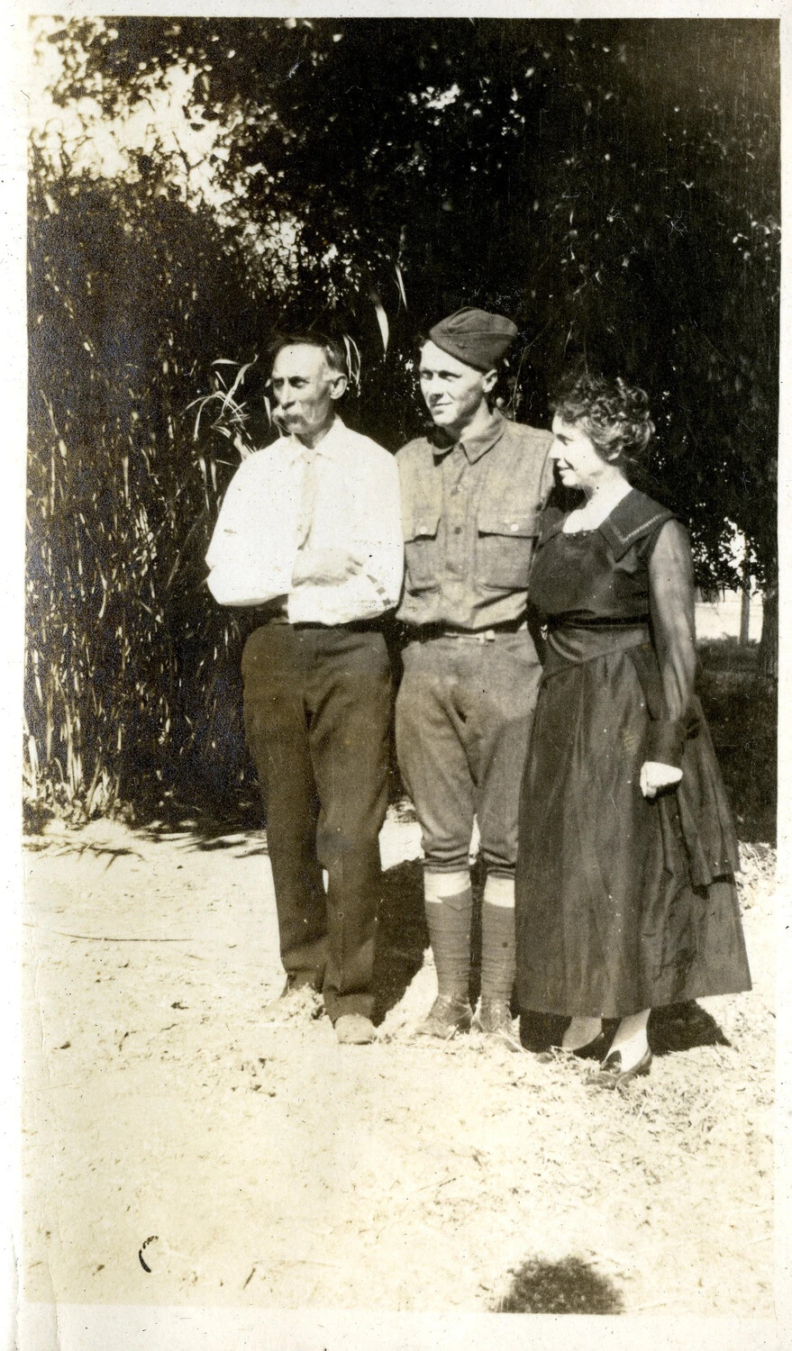 Soldier Posing with Parents, WWI Era, Late 1910s
