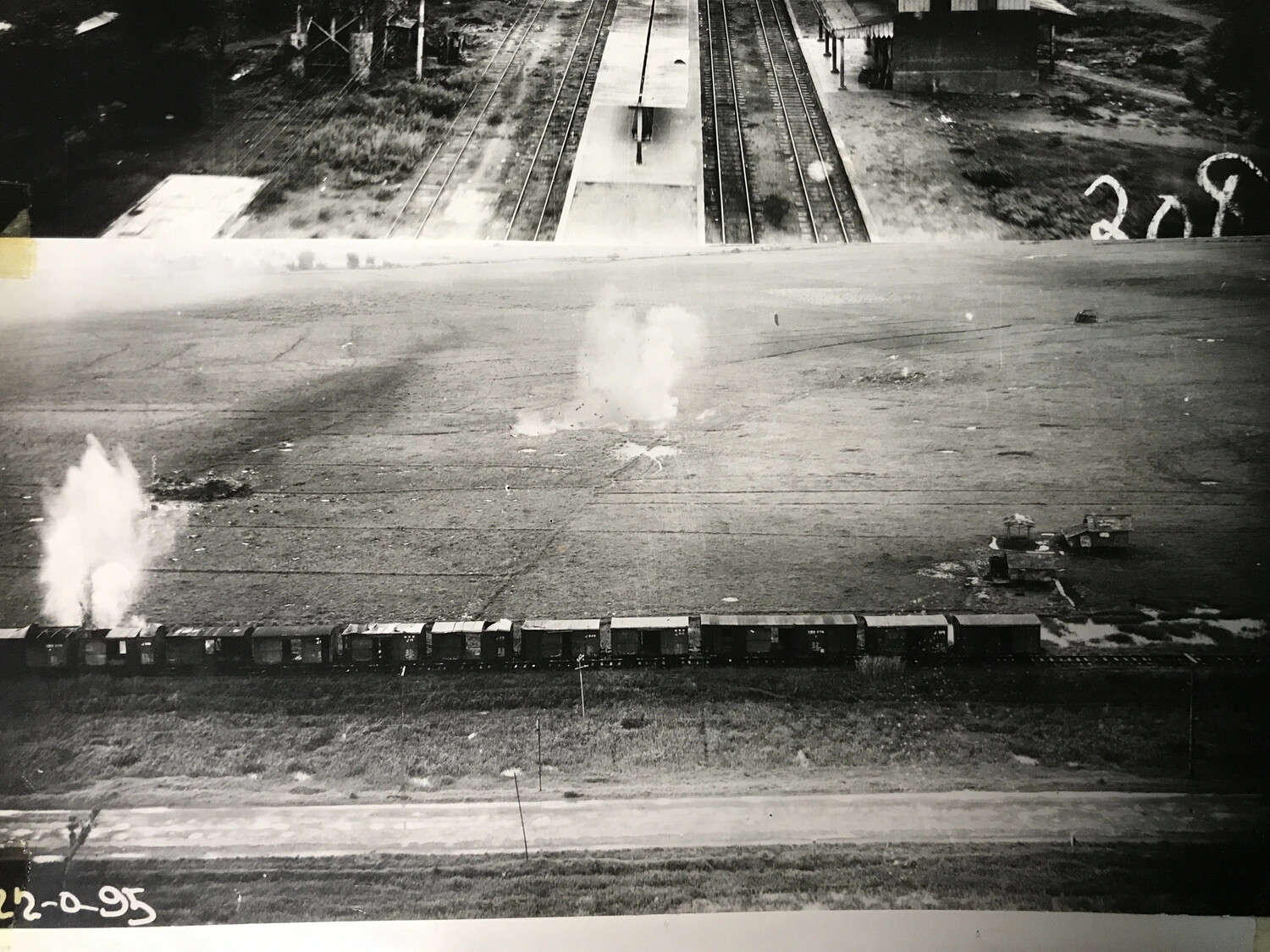 Bombing Attack on Freight Train Near Railway Station, with Ground Numeral Marking