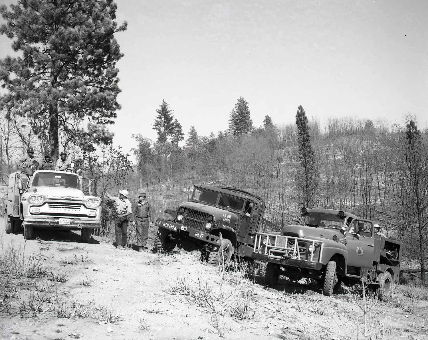 National Guard and Forestry Vehicles Staged During Wildfire Mop-Up Operation