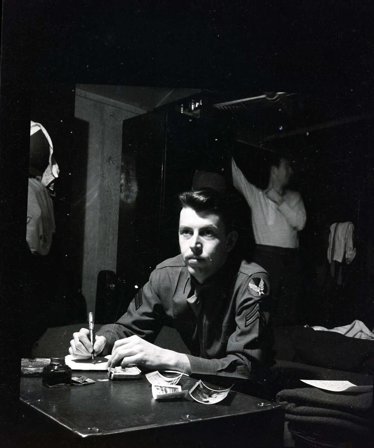 U.S. Army Air Forces Corporal Writing a Letter in Barracks Quarters, World War II Era