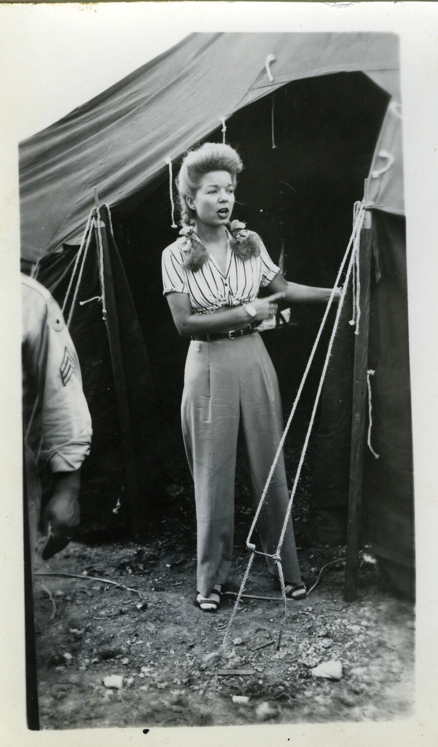 Woman in Civilian Attire Addressing Troops at a Military Tent Camp, WWII Pacific Theater