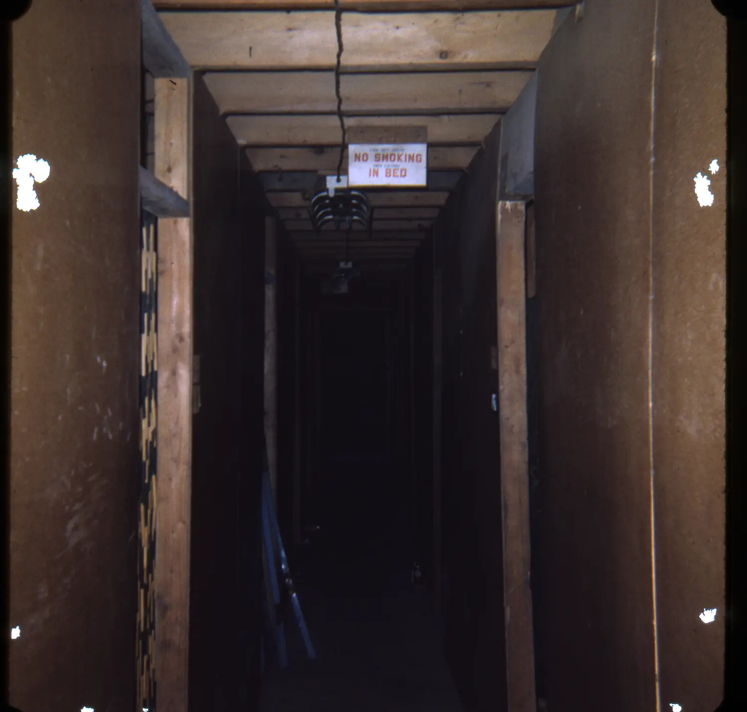 Barracks Hallway Interior with 'No Smoking in Bed' Sign, Vietnam War Era