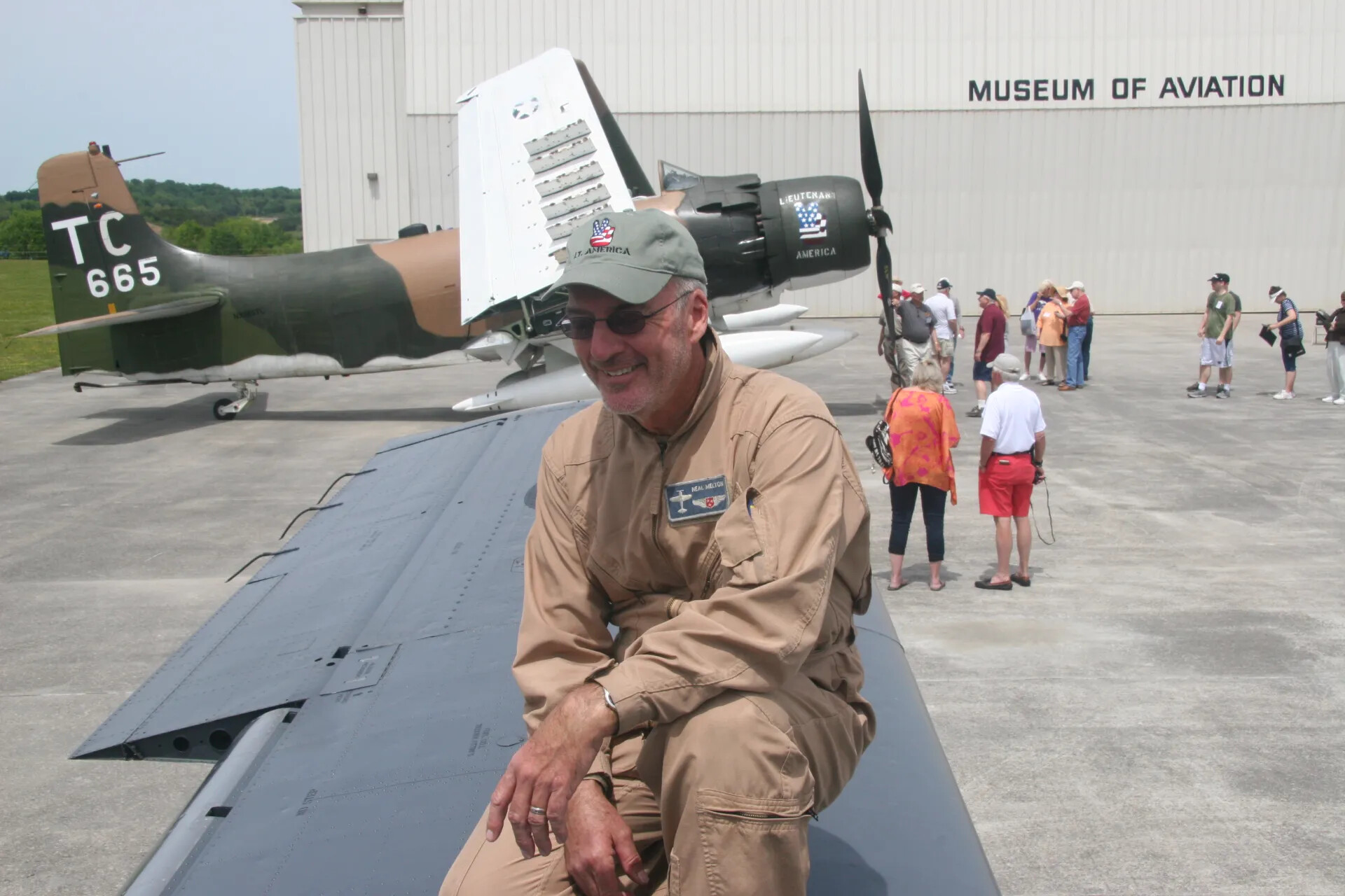 Pilot Neal Melton at the Museum of Aviation with A-1 Skyraider "TC 665," Operation Tailwind Reunion