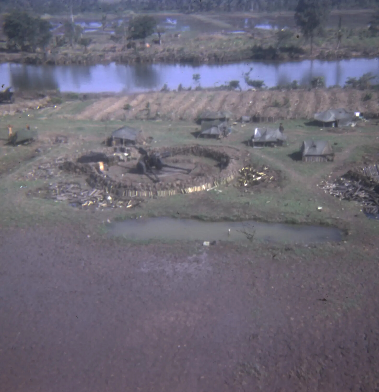 Aerial View of U.S. Artillery Firebase with Howitzer Emplacement, South Vietnam