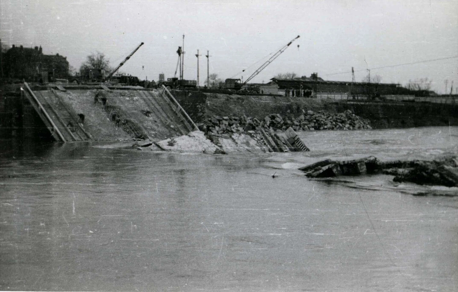 Destroyed Bridge Span Collapsed into Flooded River with Salvage Cranes, Western European Theater, WWII