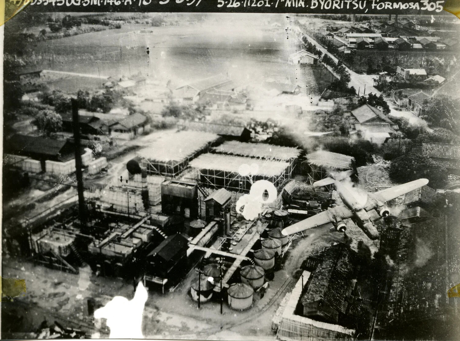 Low-Level Strike Photograph, B-25 Mitchell Over Industrial Target, Byoritsu, Formosa