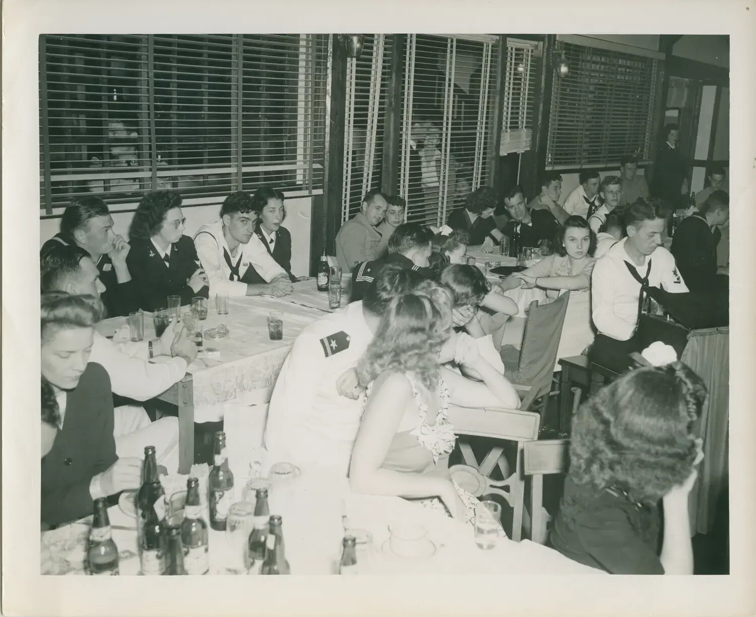 Navy Enlisted Men and Women Gathered at a Club or Banquet Reception