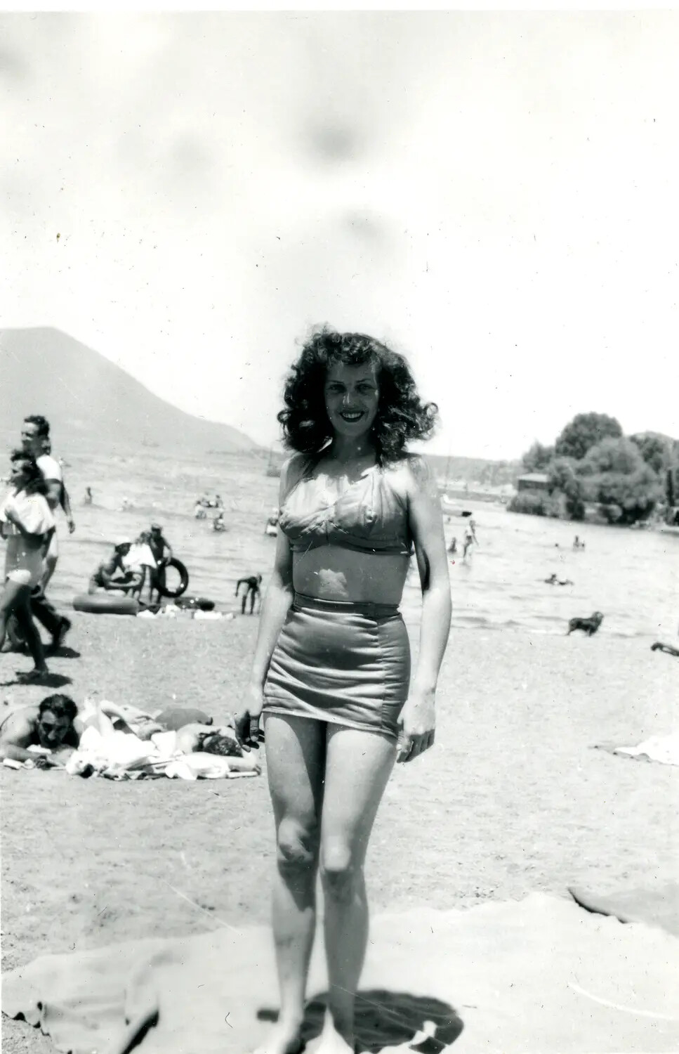 Woman in 1940s Two-Piece Swimsuit on Beach, Personal Snapshot (WWII China Burma Theater Archive Collection)
