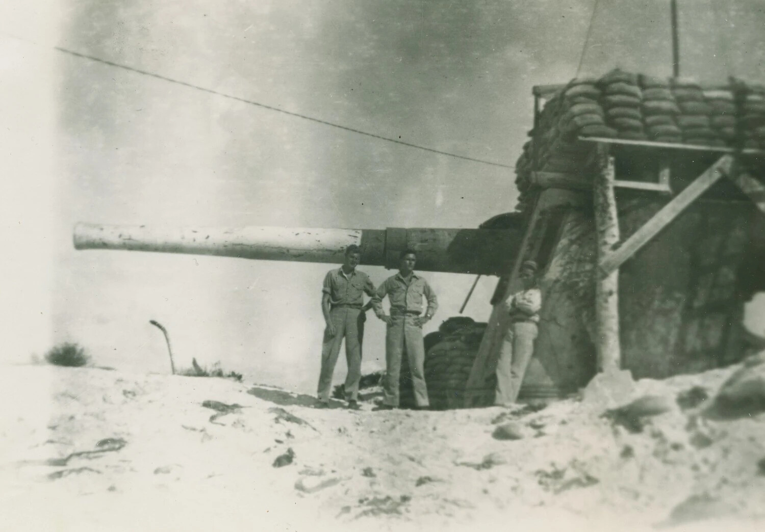 American Servicemen at Captured Coastal Defense Gun Emplacement, Pacific Theater, WWII