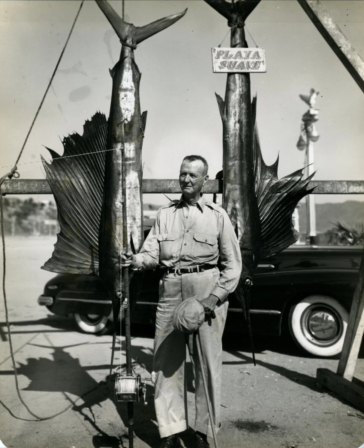 General Jonathan M. Wainwright Posing with Trophy Sailfish at 'Playa Suave,' Acapulco, Mexico, 1949