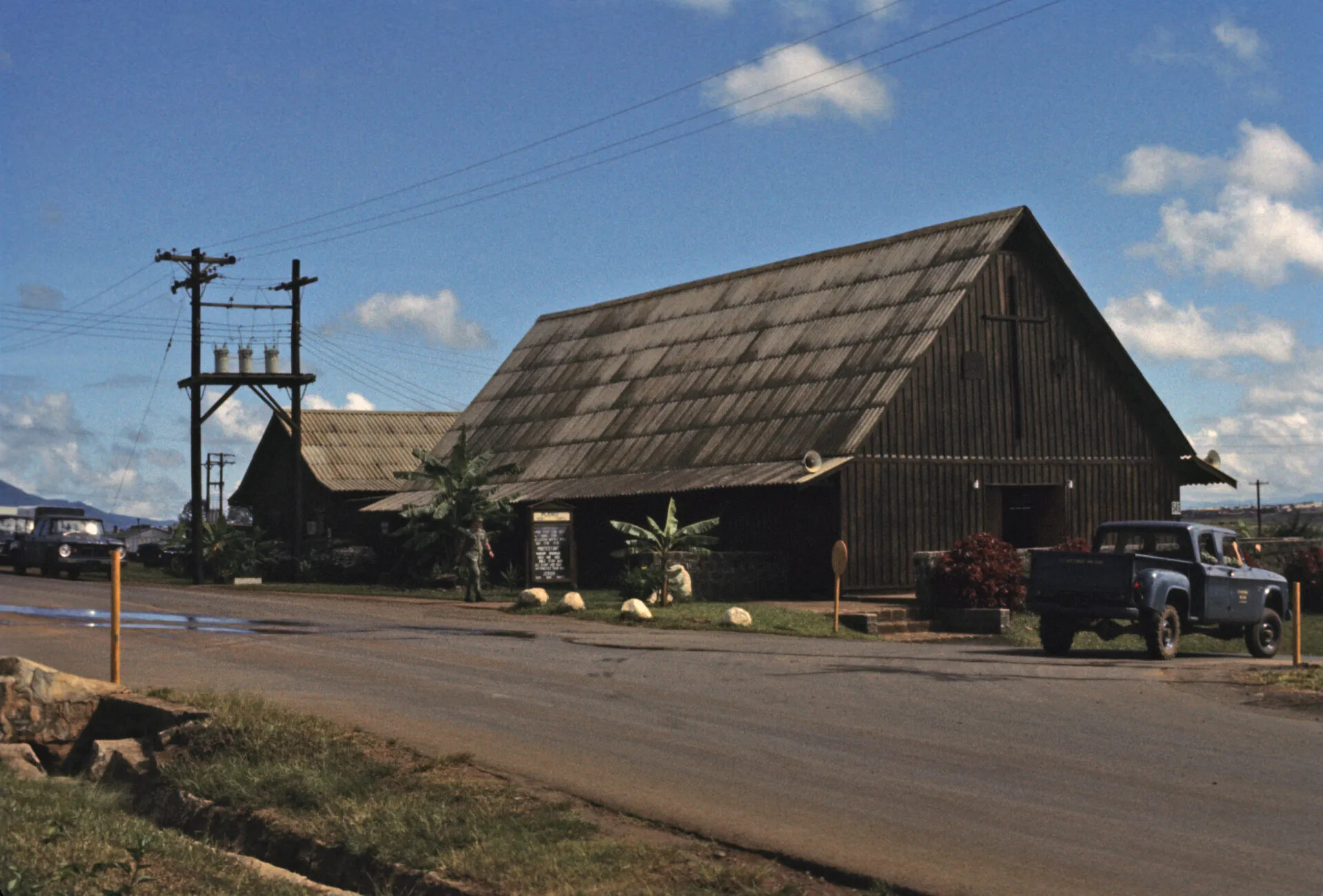 Base Chapel with A-Frame Roof and Service Notice Board, USAF Installation, Republic of Vietnam, circa November 1969