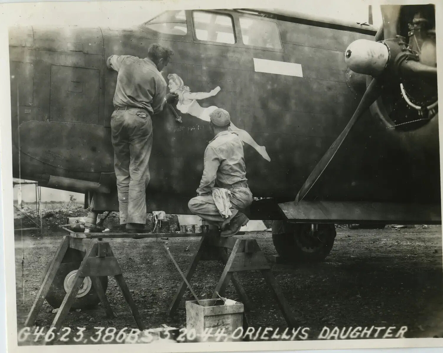 Ground Crew Applying 'O'Reilly's Daughter' Nose Art, 386th Bomb Squadron, 312th Bomb Group, 20 May 1944