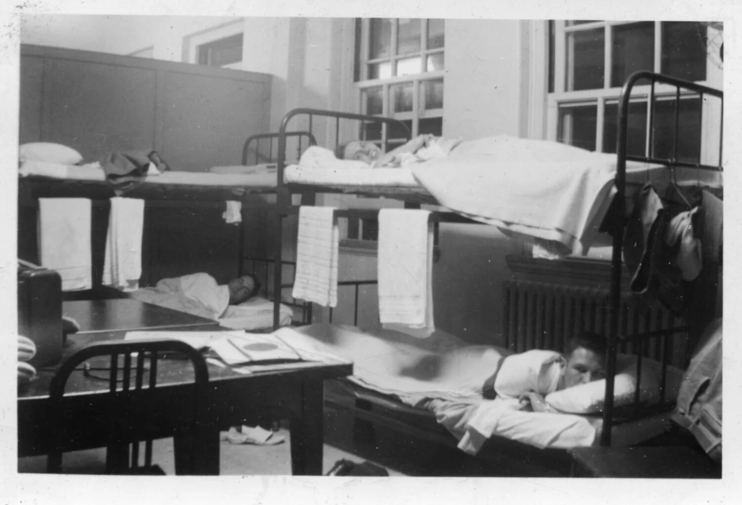 Barracks Interior with Sailors Resting on Bunks, Korean War Era