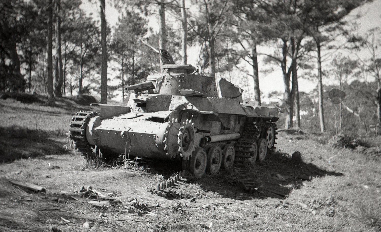 Abandoned Japanese Type 97 Chi-Ha Medium Tank with Battle Damage, Luzon, Philippines, WWII