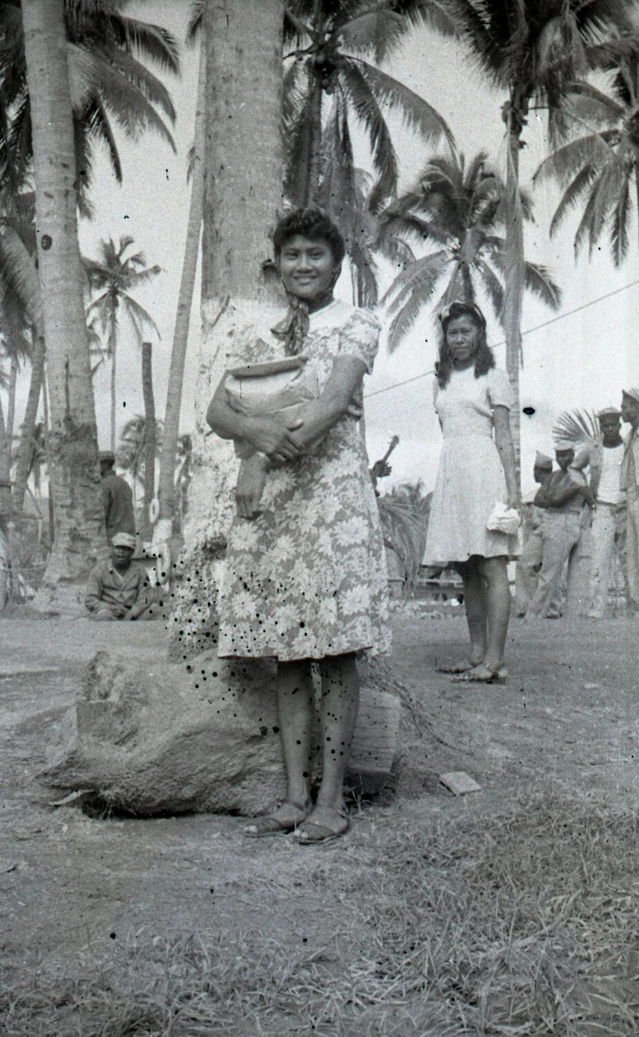 Portrait of a Young Filipina Woman in a Coconut Grove, Luzon, Philippines, WWII Era