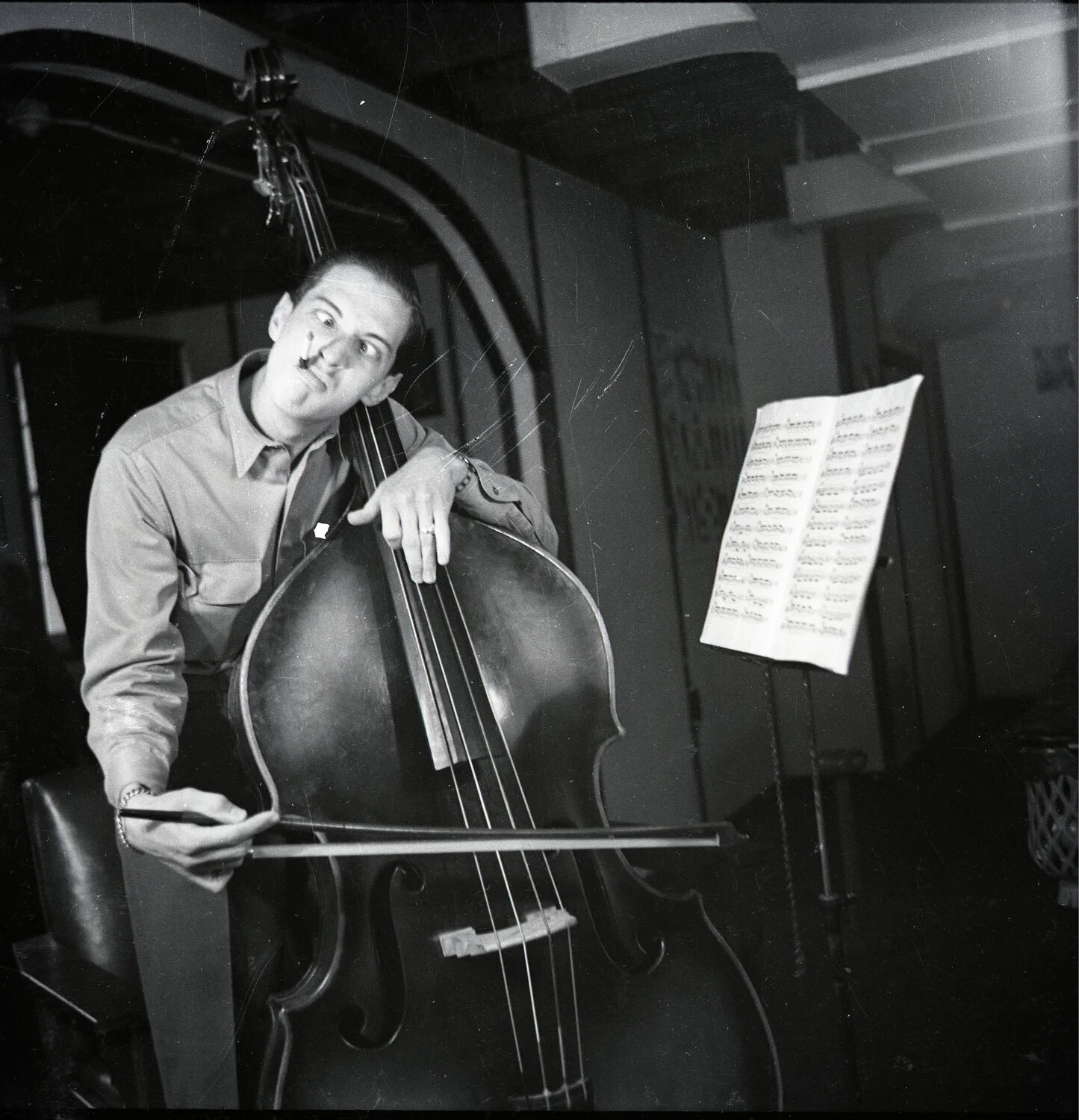Bassist Playing Upright Double Bass During Rehearsal